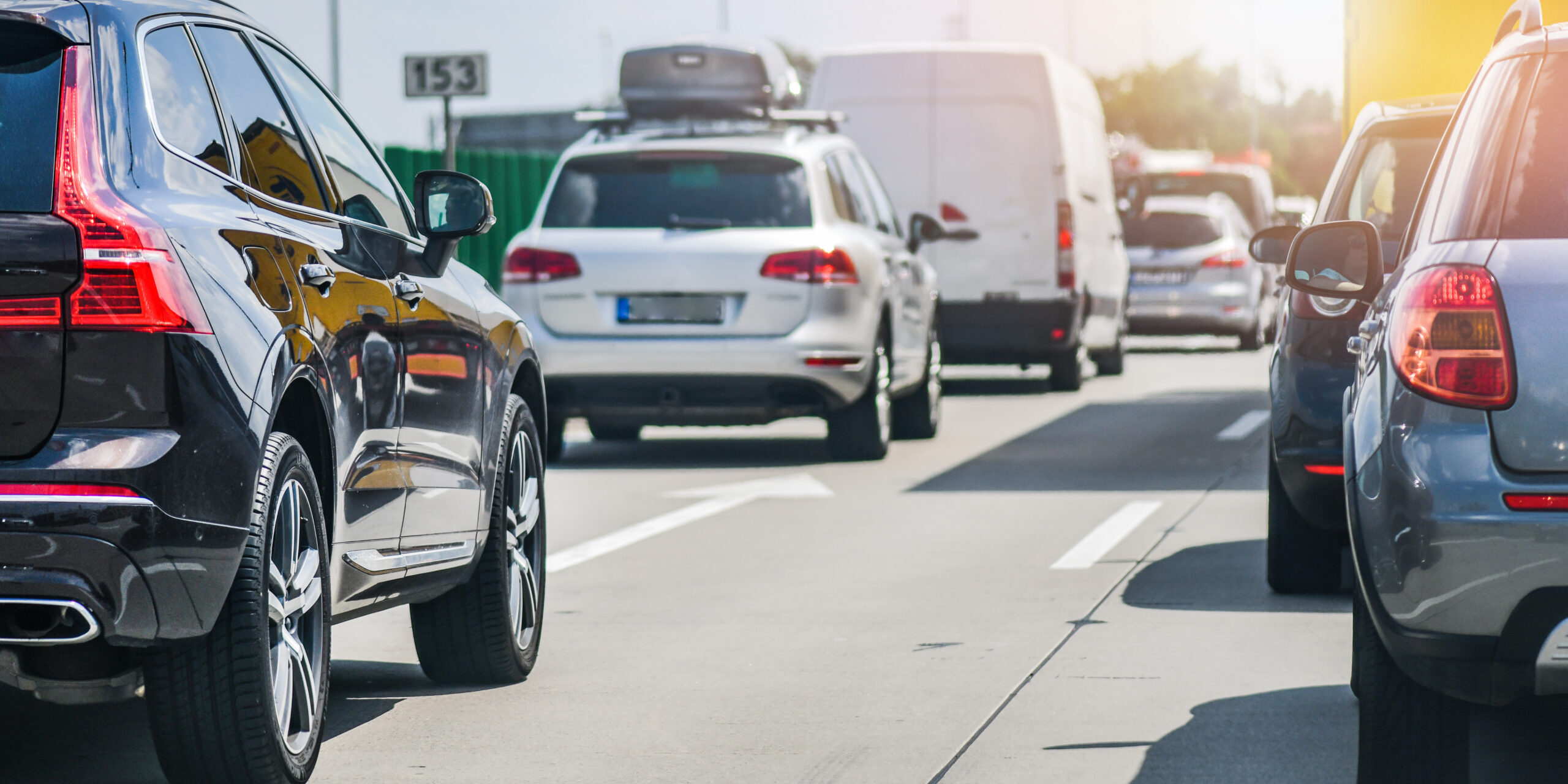 Car rush hours city street. Cars on highway in traffic jam